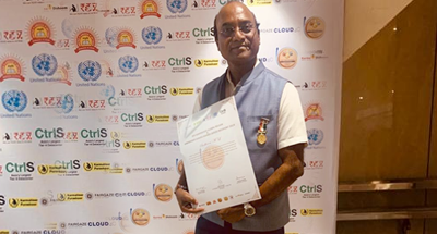 Sudheen M Founder of Crystal Hues Awarded REX Karmaveer Chakra Gold Award